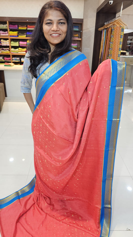 Mysore crepe silk saree with KSIC Finish in baby pink with blue in allover buttas pattern