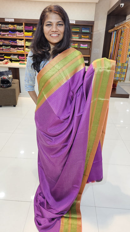 Mysore crepe silk saree with KSIC Finish in purple with peach checks pattern in kanchi border