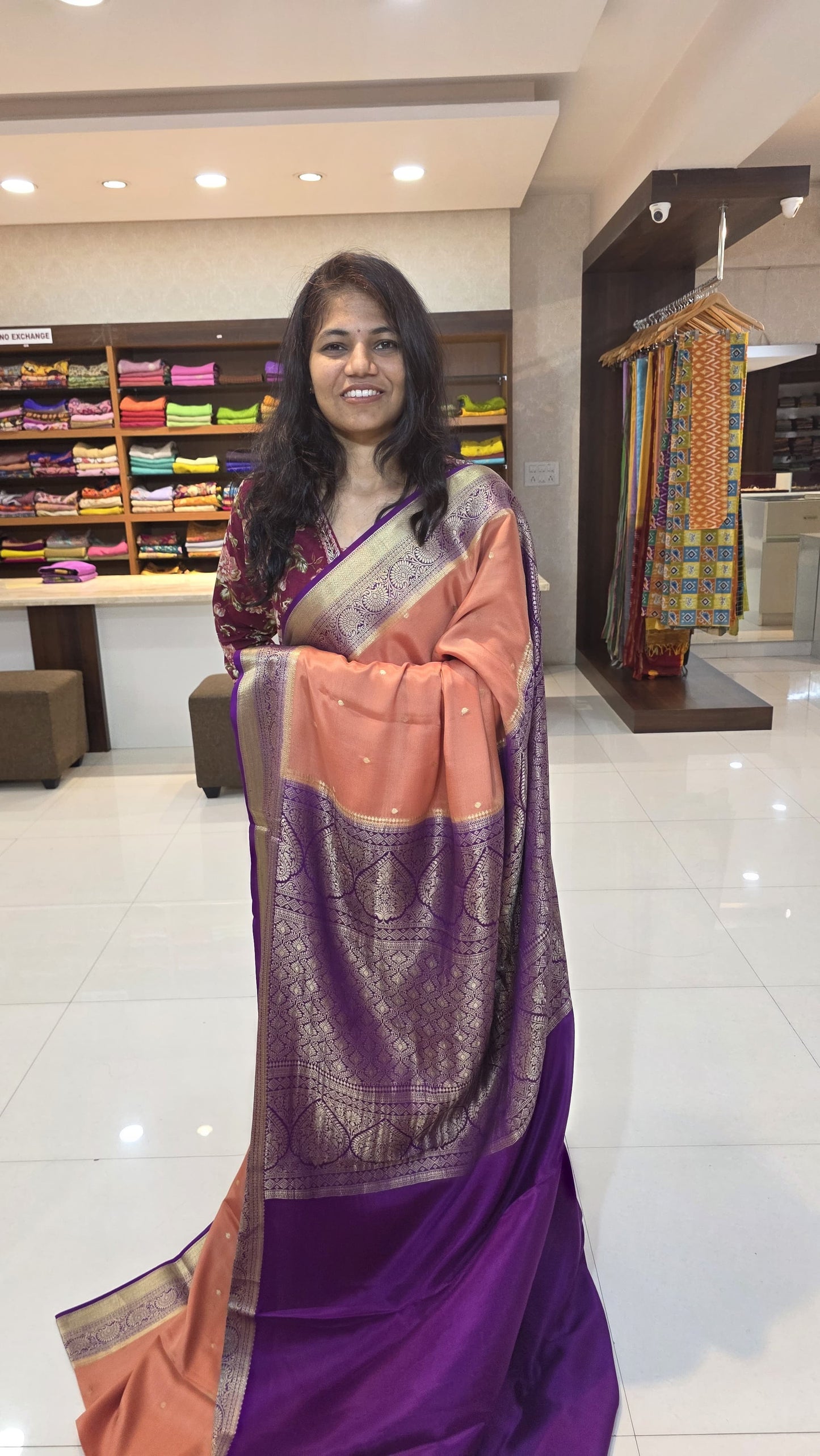 Mysore crepe silk saree with KSIC Finish in rust orange with purple in allover zari buttas pattern