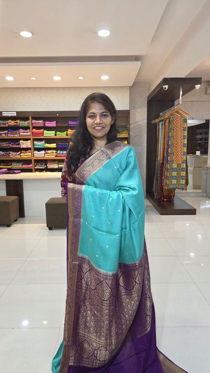 Mysore crepe silk saree with KSIC Finish in sky blue with purple in allover zari buttas pattern