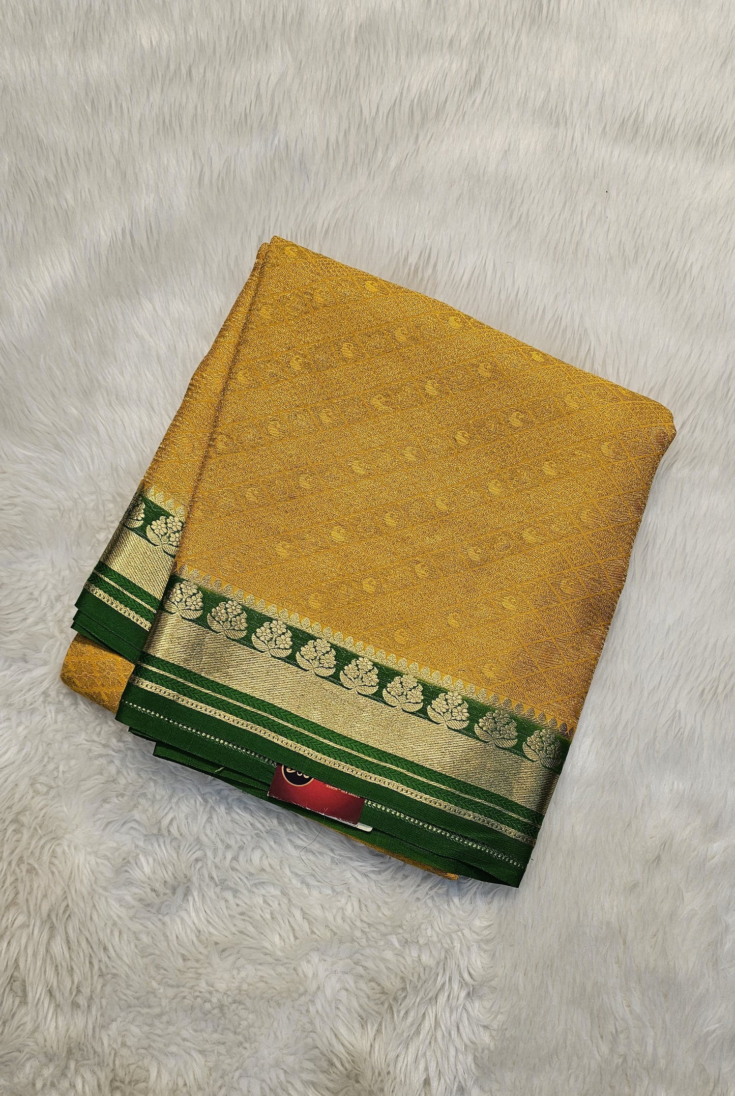 Mysore crepe silk saree with KSIC Finish in mustard with green in allover zari brocade pattern
