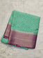 Mysore crepe silk saree with KSIC Finish in distemper green with rani pink in allover zari buttas pattern