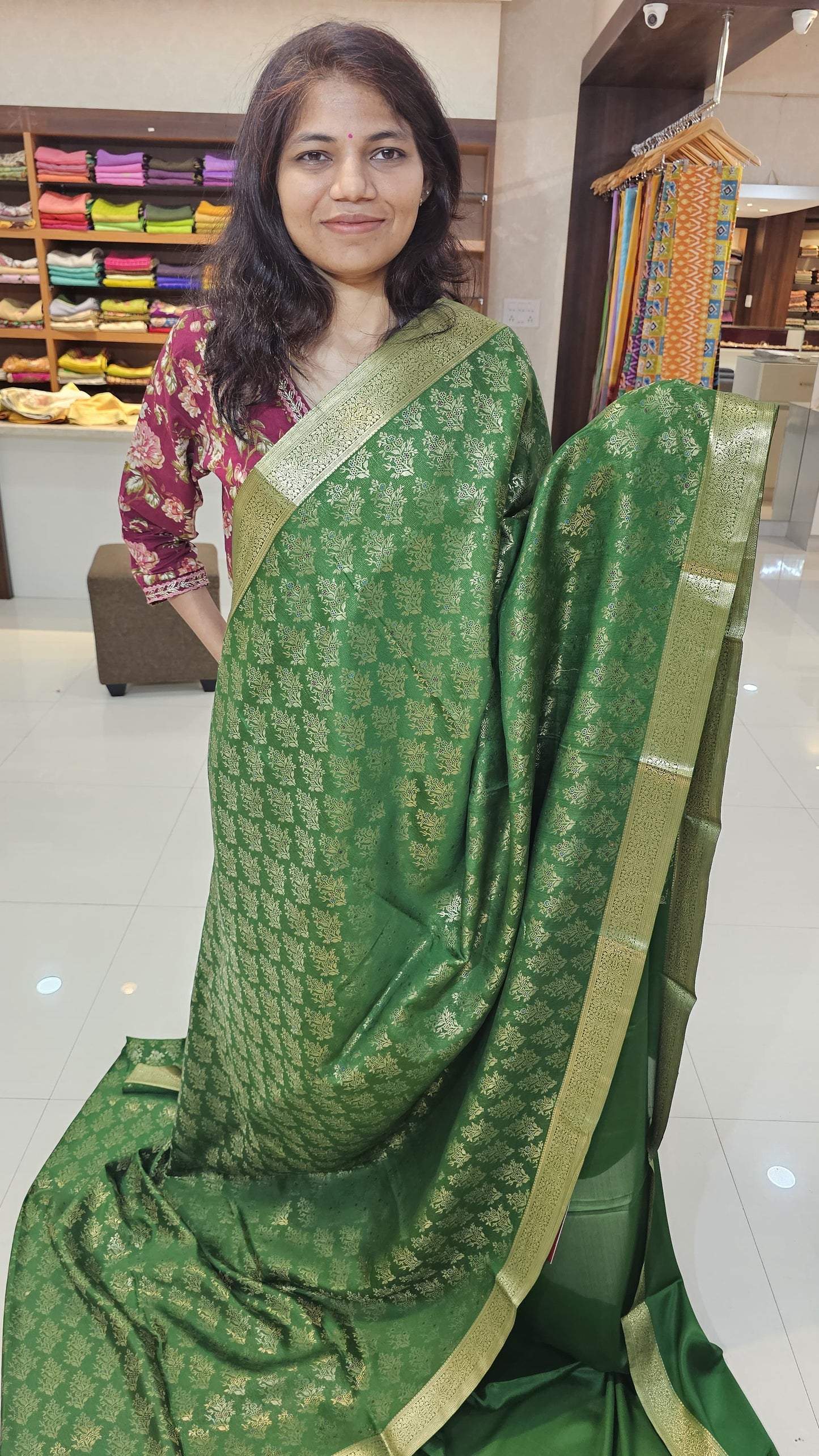 Mysore crepe silk saree with KSIC Finish in leaf green in allover zari buttas pattern