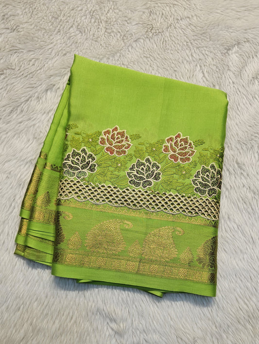 Mysore crepe silk saree with KSIC Finish in parrot green self in one side cutwork pattern