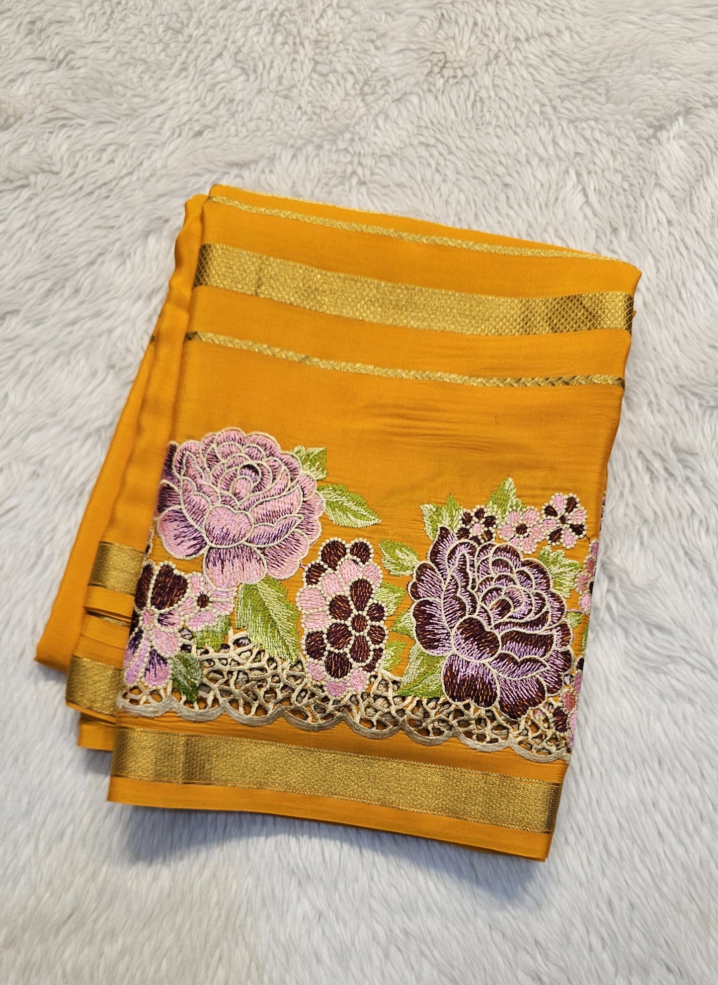 Mysore crepe silk saree with KSIC Finish in orange self in one side cutwork pattern