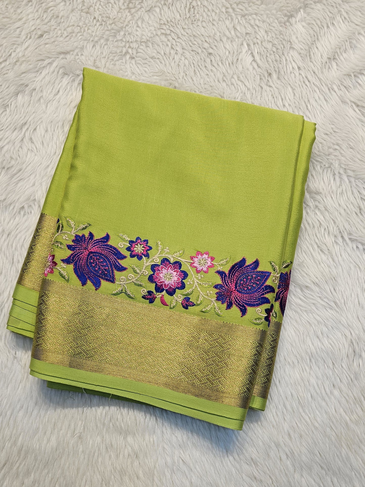 Mysore crepe silk saree with KSIC Finish in pista green in one side cutwork pattern
