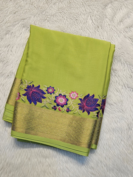 Mysore crepe silk saree with KSIC Finish in pista green in one side cutwork pattern
