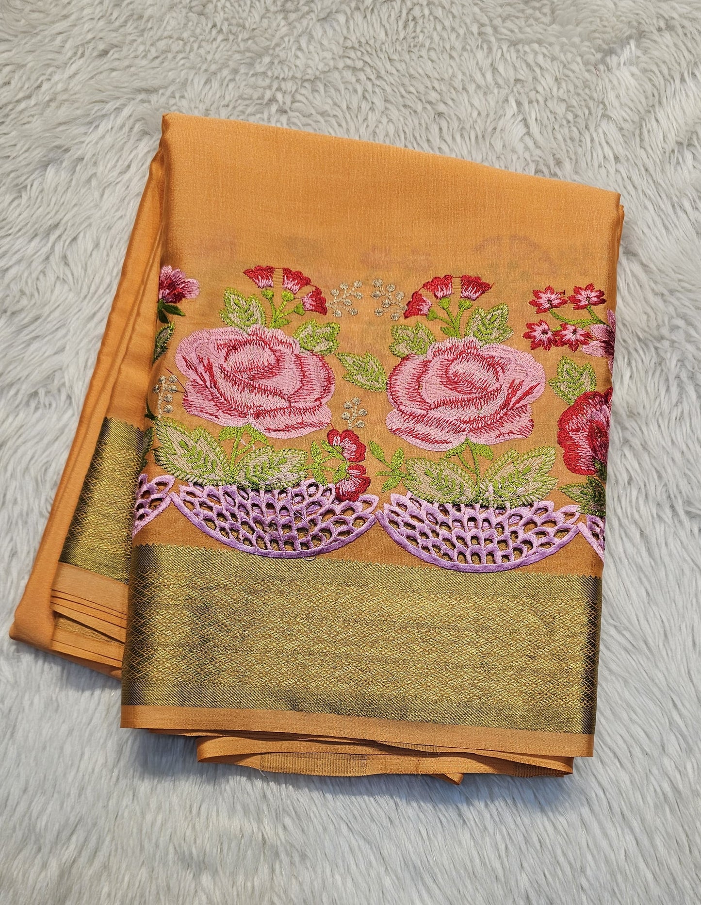 Mysore crepe silk saree with KSIC Finish in light peach in one side cutwork pattern