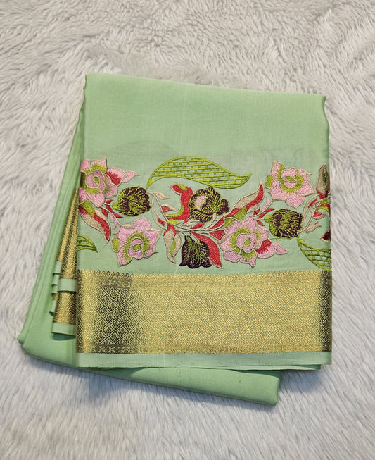 Mysore crepe silk saree with KSIC Finish in sea green in one side cutwork pattern