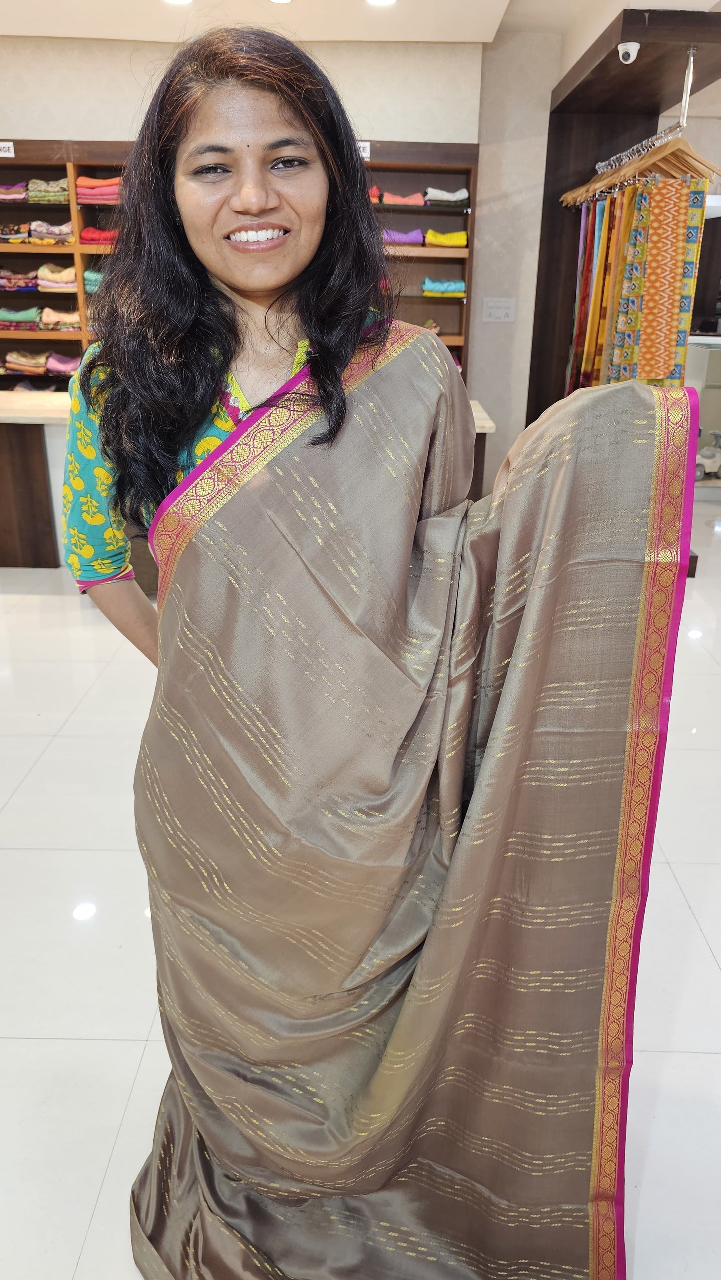 Mysore crepe silk saree with KSIC Finish in kiwi with rani pink in brocade zari pattern