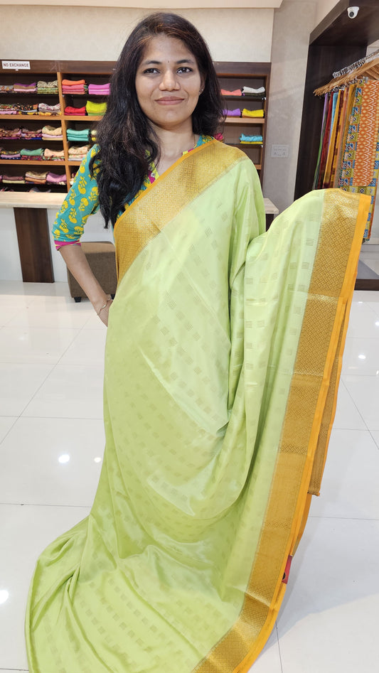 Mysore crepe silk saree with KSIC Finish indistemper green with mango yellow in checks pattern