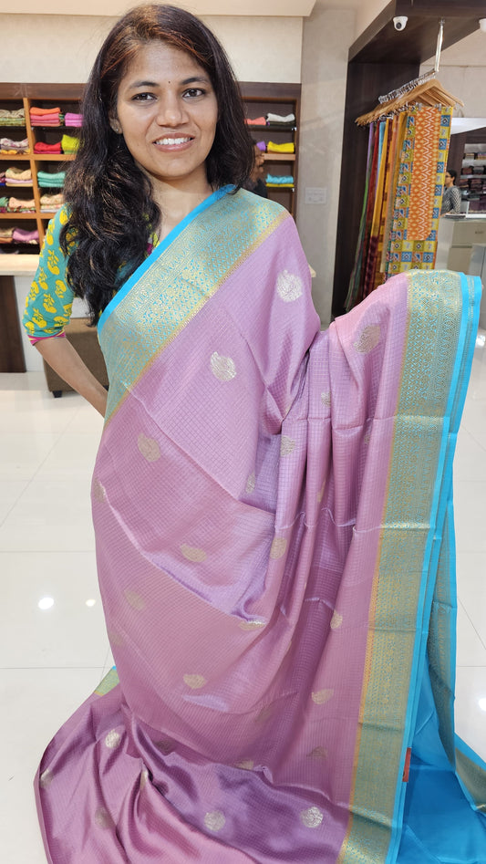 Mysore crepe silk saree with KSIC Finish in onion pink with blue in checks pattern with mango motifs