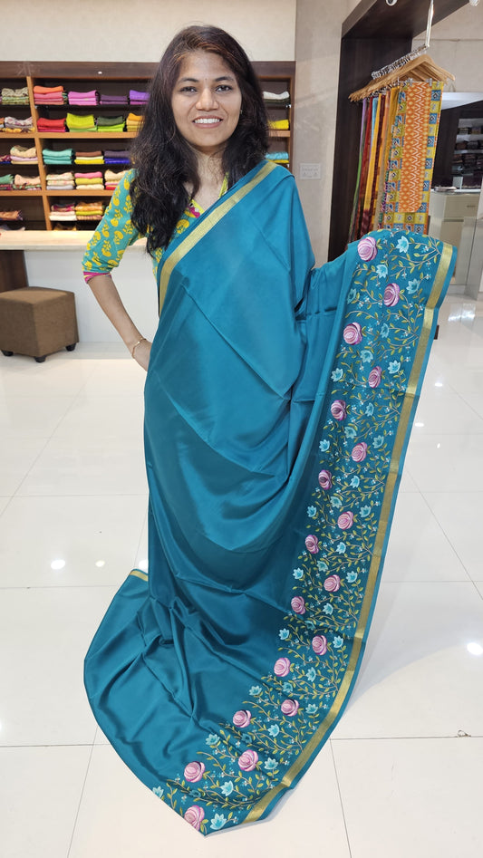 Mysore crepe silk saree with KSIC Finish in rama green self in embroidey pattern