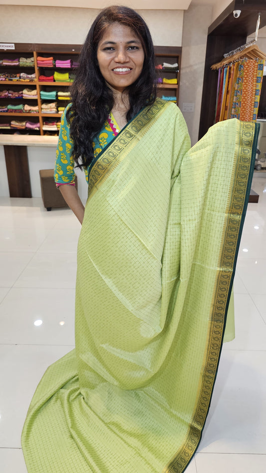 Mysore crepe silk saree with KSIC Finish in pista green with bottle green in checks pattern