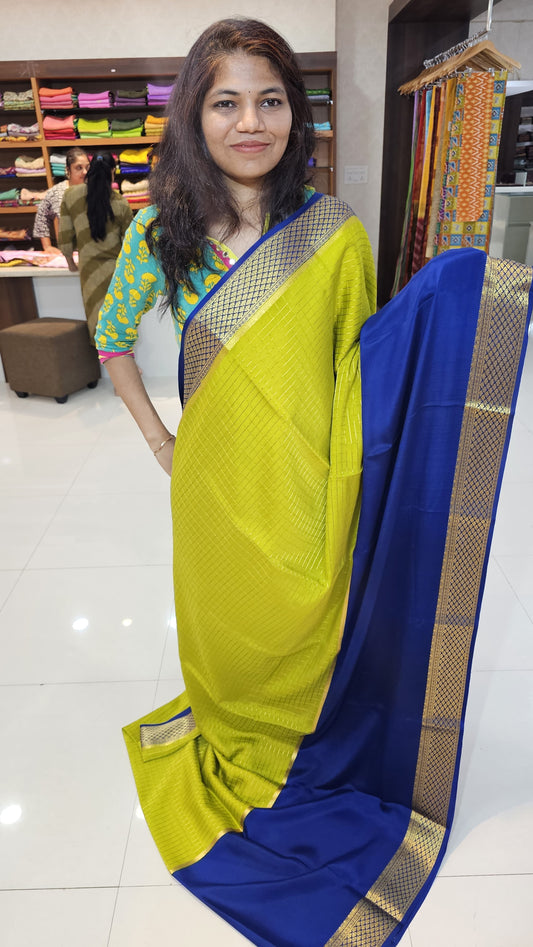 Mysore crepe silk saree with KSIC Finish in lemon green with royal blue in half and half checks pattern