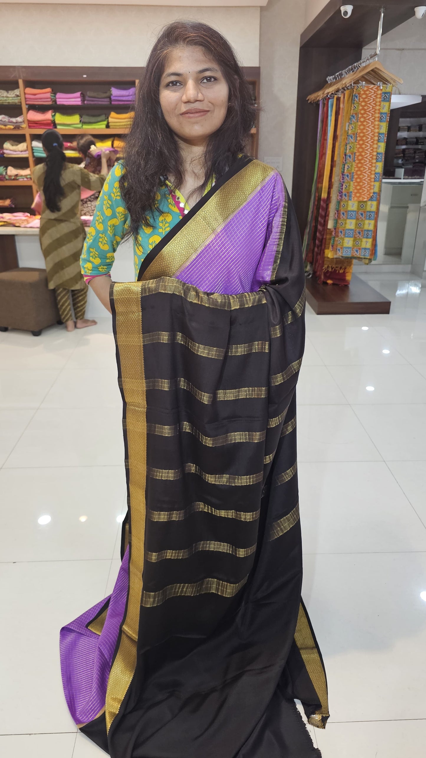 Mysore crepe silk saree with KSIC Finish in purple with black in half and half checks pattern