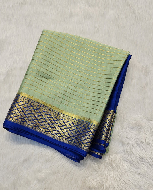 Mysore crepe silk saree with KSIC Finish in mint with ink blue in half and half checks pattern