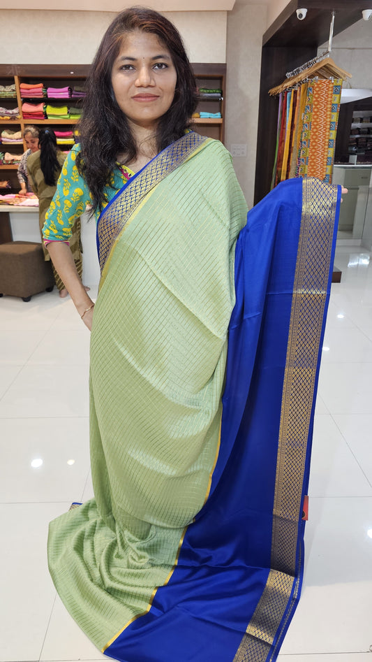 Mysore crepe silk saree with KSIC Finish in mint with ink blue in half and half checks pattern