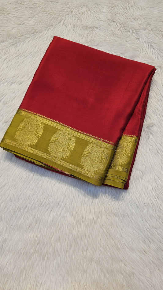 mysore crepe silk sarees in KSIC Finish in red with mehendi green in ganda berunda border
