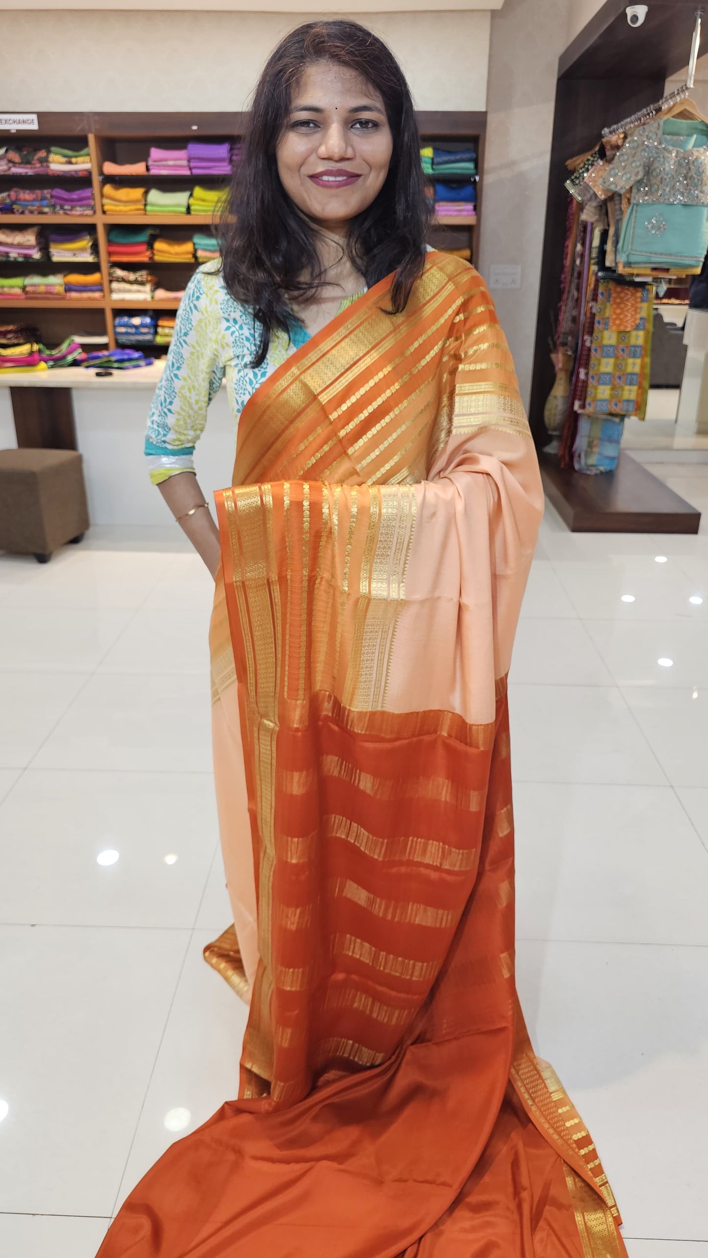 mysore crepe silk sarees in KSIC Finish in peach with rust orange in bentex border
