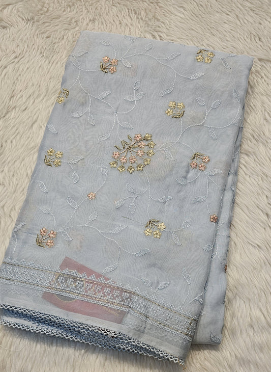 semi organza fancy saree in ice blue with allover embroidery work