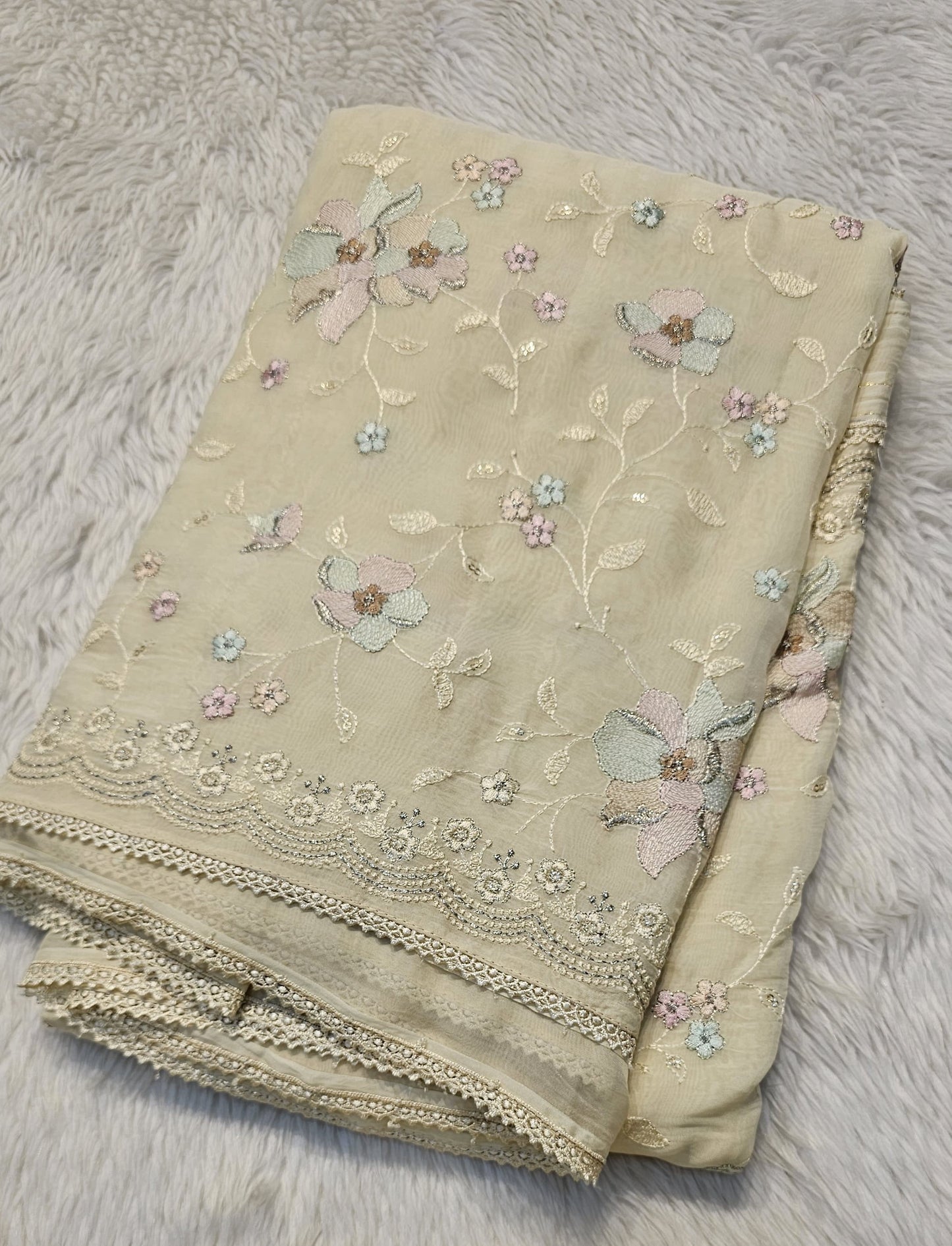 semi organza fancy saree in light bige self with allover embroidery work