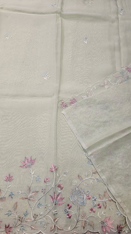 Semi organza fancy saree in light sea green self with allover embroidery work