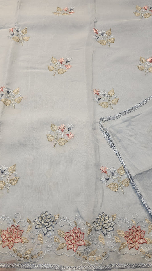 semi organza fancy saree in ice blue self with allover embroidery work