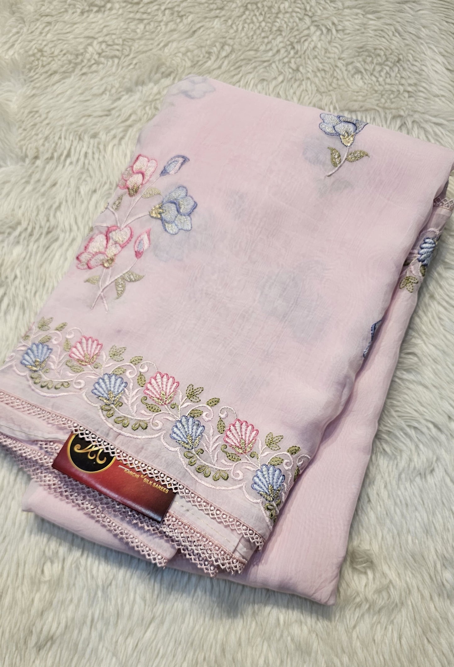 Semi organza fancy saree in light pink self with allover embroidery work