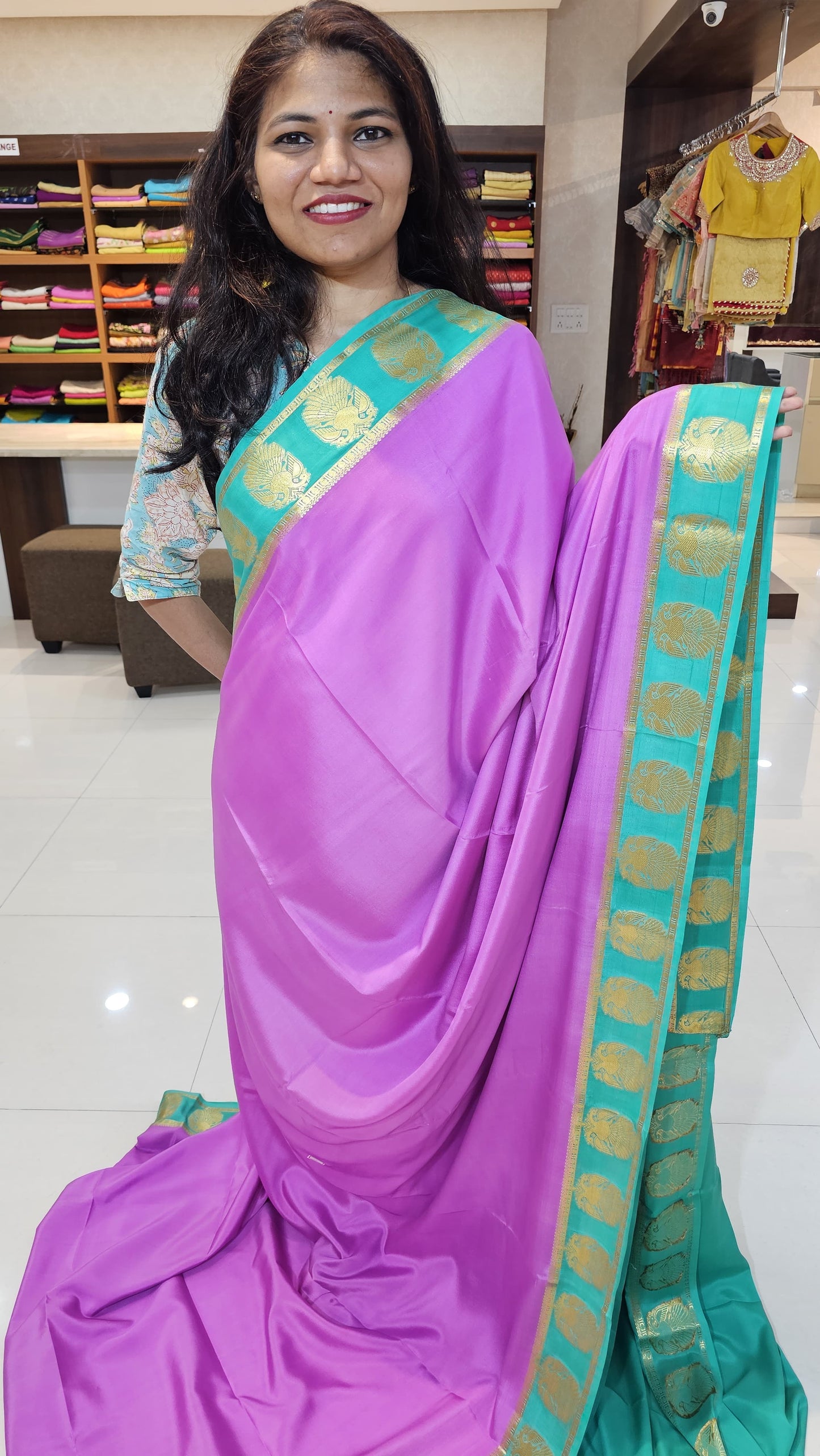 mysore crepe silk sarees in KSIC Finish in onion pink with teal ganda berunda border
