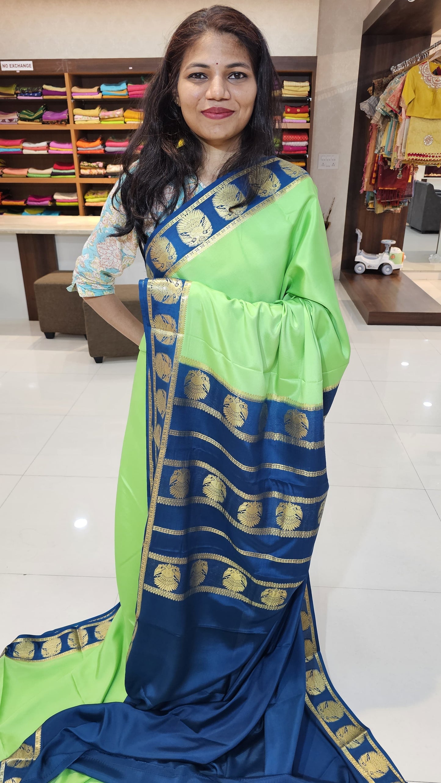 Mysore Crepe Silk Sarees in KSIC Finish in mint green with peacacok blue ganda berunda border border