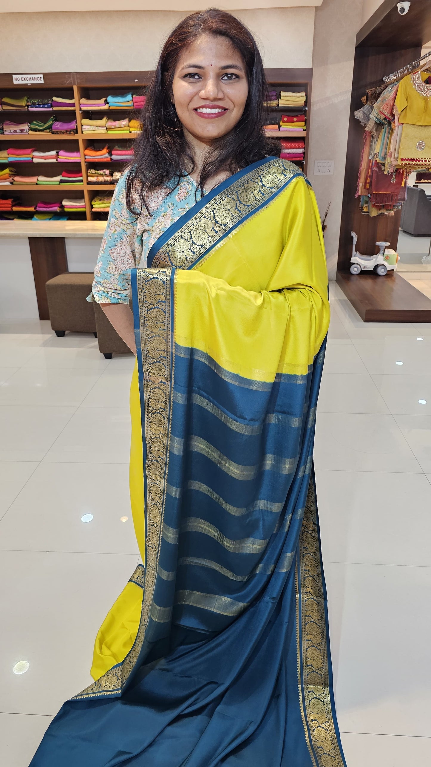 mysore crepe silk sarees in KSIC Finish in lemon green with peacock blue in peacock border