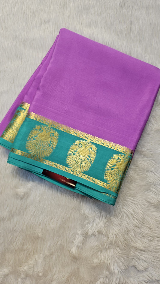mysore crepe silk sarees in KSIC Finish in onion pink with teal ganda berunda border