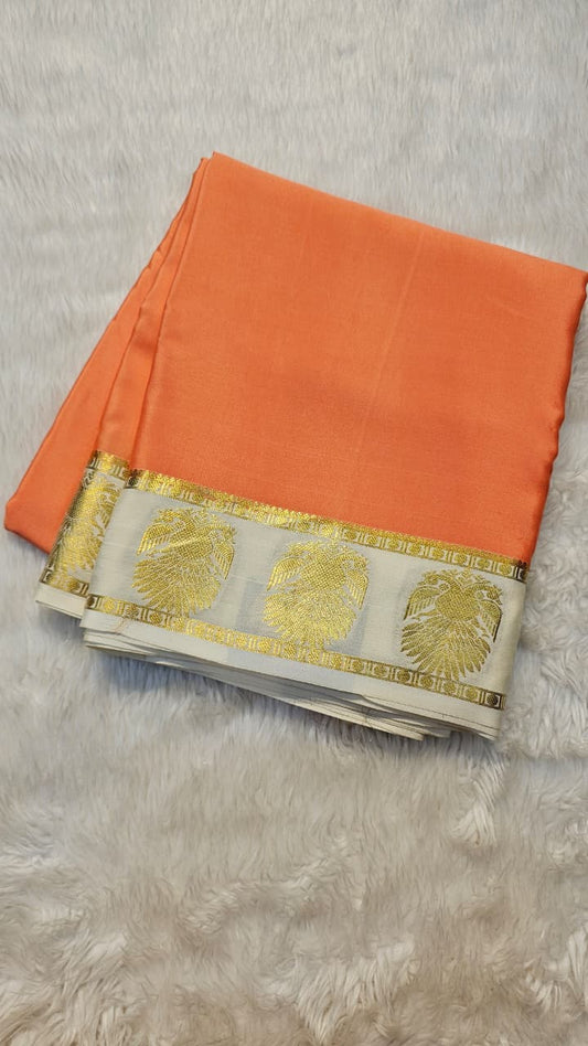 mysore crepe silk sarees in KSIC Finish in peach with half white in ganda berunda border