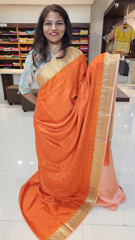 Mysore Crepe Silk Sarees in KSIC Finish in orange with peach pink mango border checks pattern