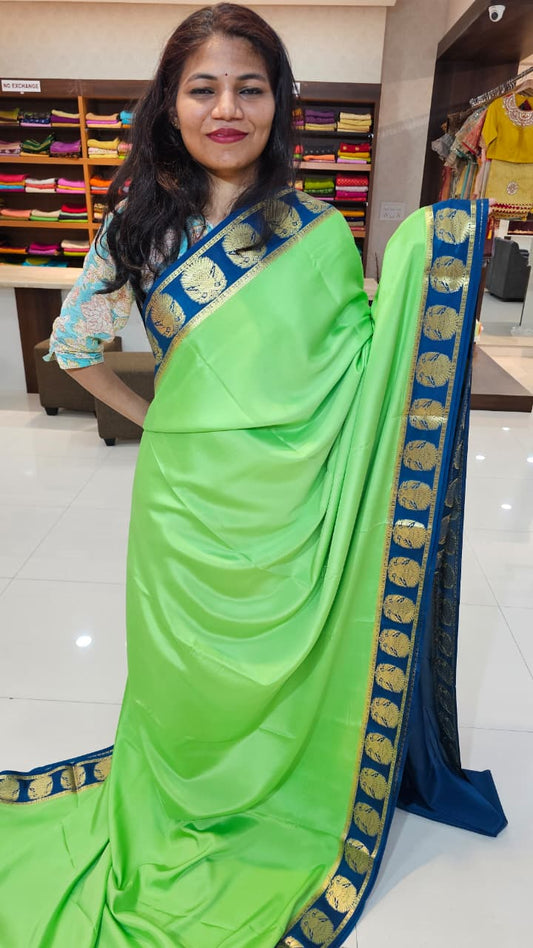 Mysore Crepe Silk Sarees in KSIC Finish in mint green with peacacok blue ganda berunda border border