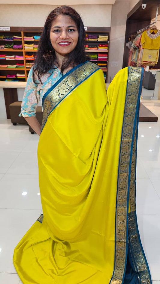 mysore crepe silk sarees in KSIC Finish in lemon green with peacock blue in peacock border