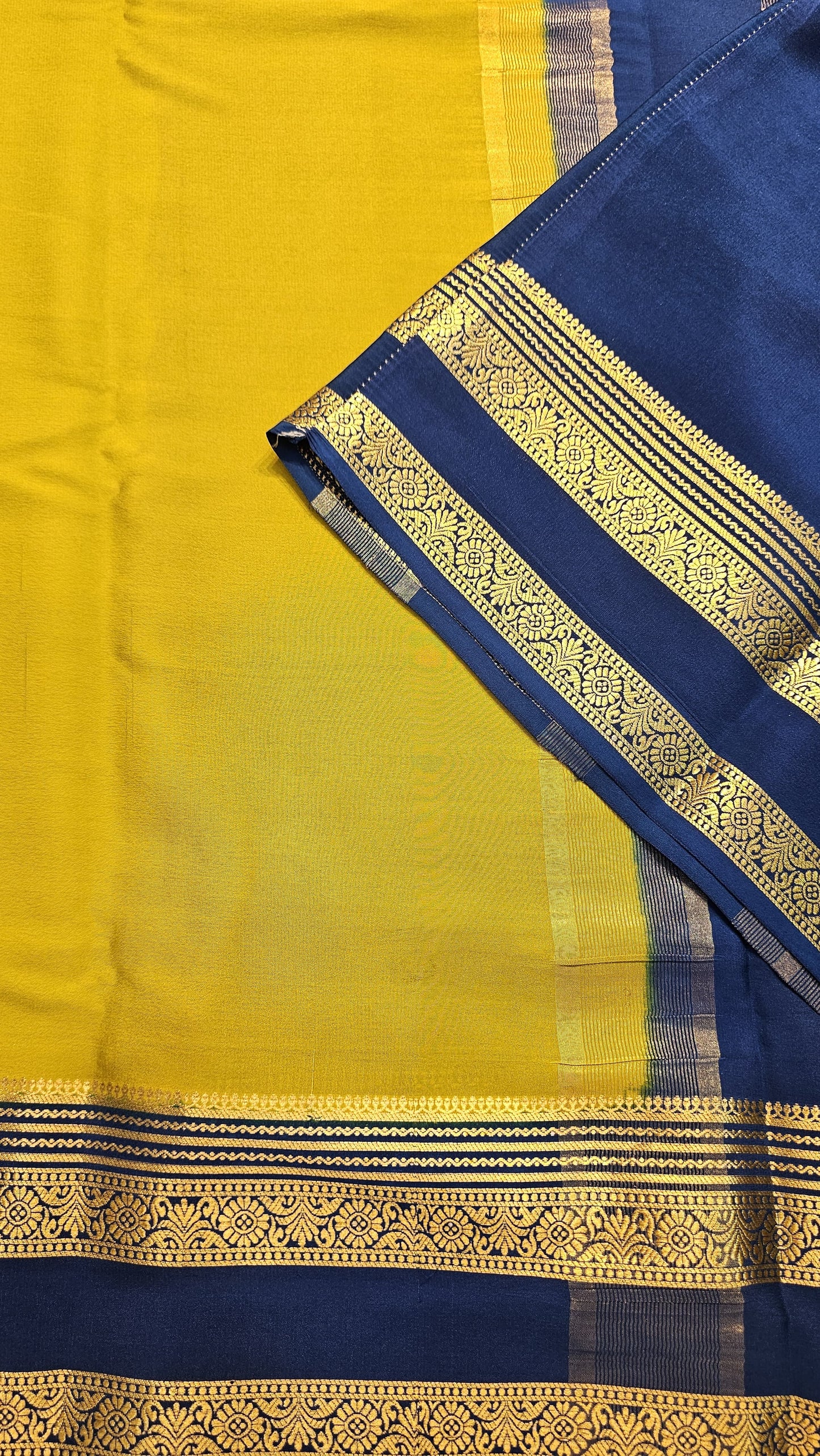 mysore crepe silk sarees in KSIC Finish in light mehendi green with peacock blue bentex border