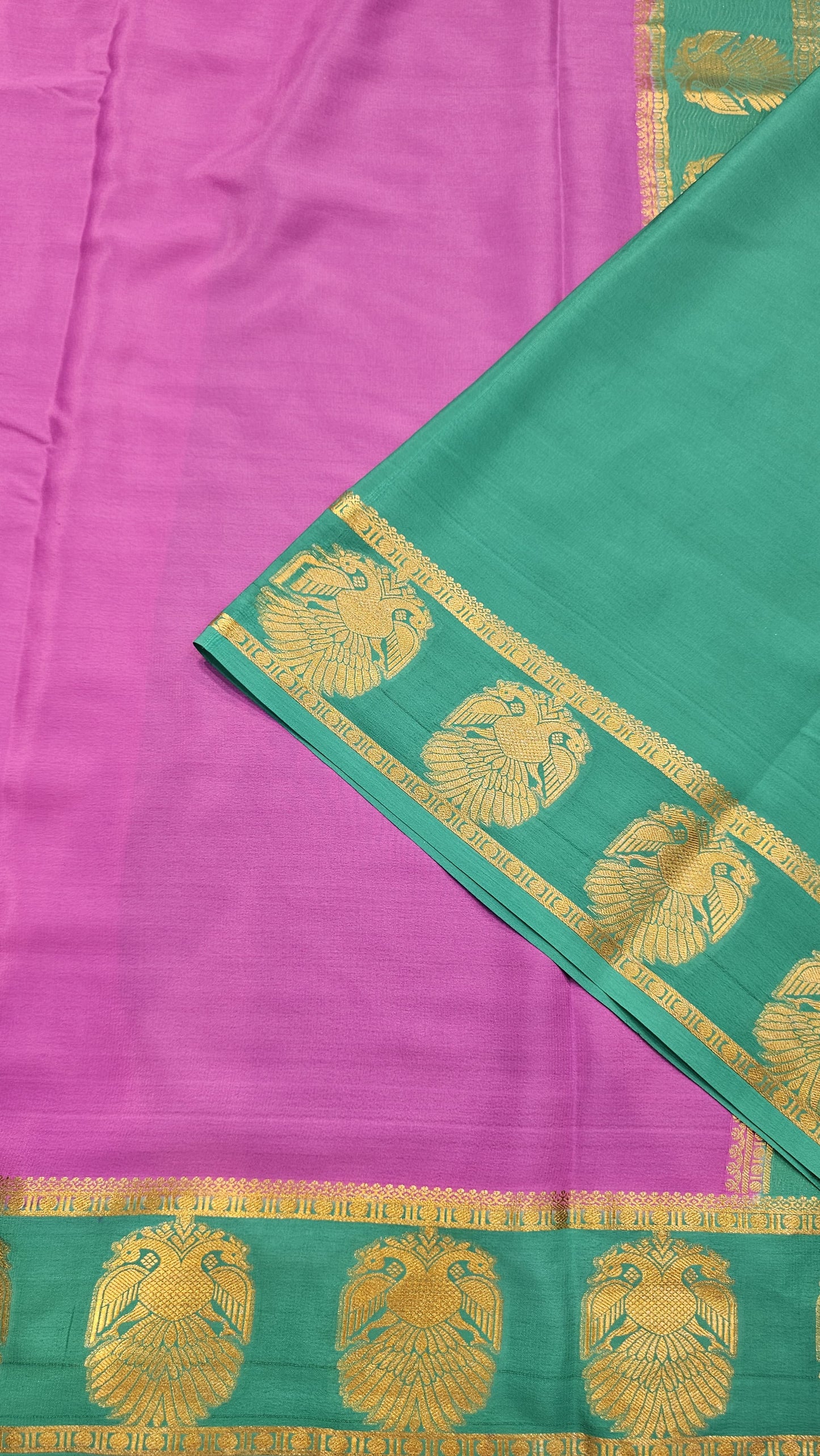 mysore crepe silk sarees in KSIC Finish in onion pink with teal ganda berunda border