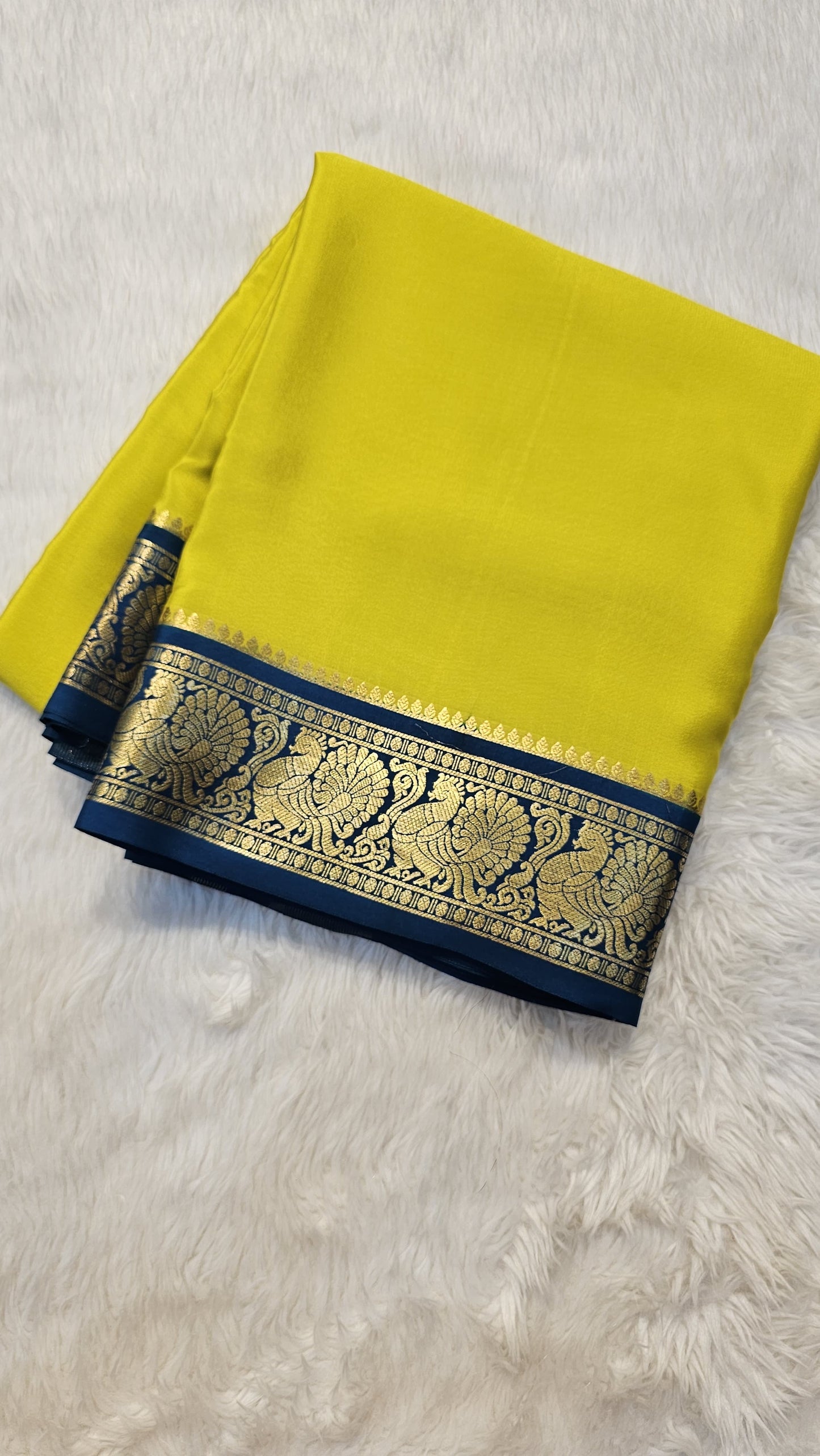 mysore crepe silk sarees in KSIC Finish in lemon green with peacock blue in peacock border