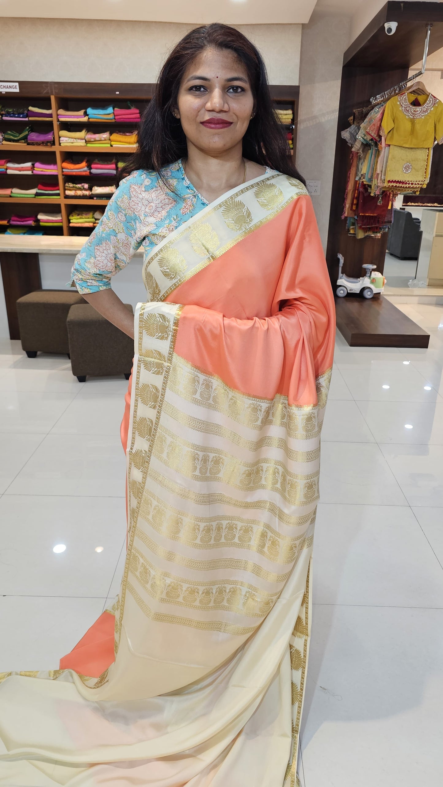 mysore crepe silk sarees in KSIC Finish in peach with half white in ganda berunda border