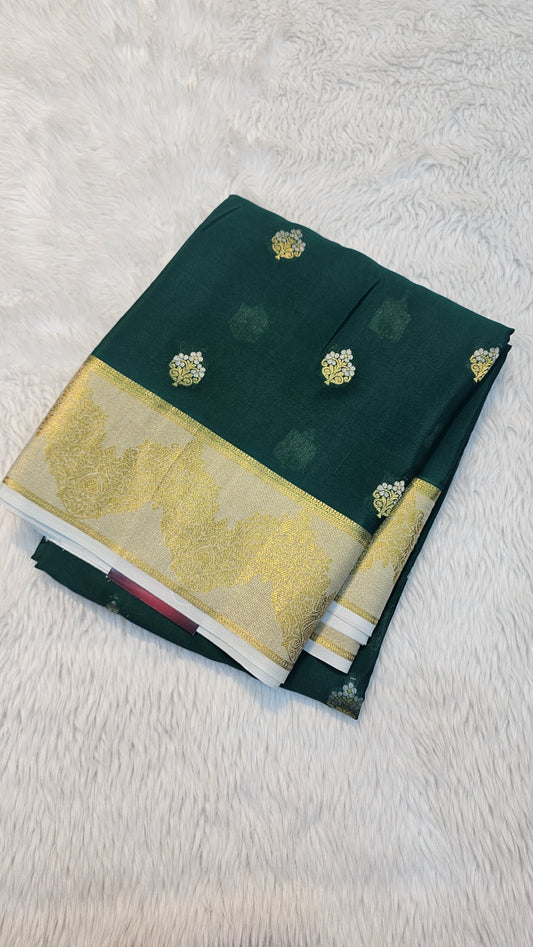 mysore crepe silk sarees in KSIC Finish in bottle green with half white tissue border