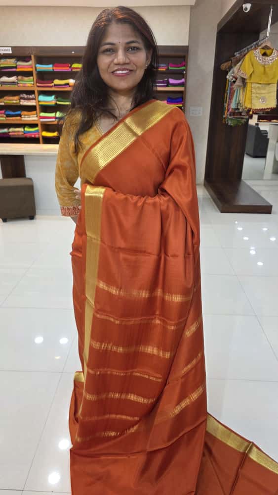 Mysore crepe silk saree in KSIC Finish in rust orange single tone saree