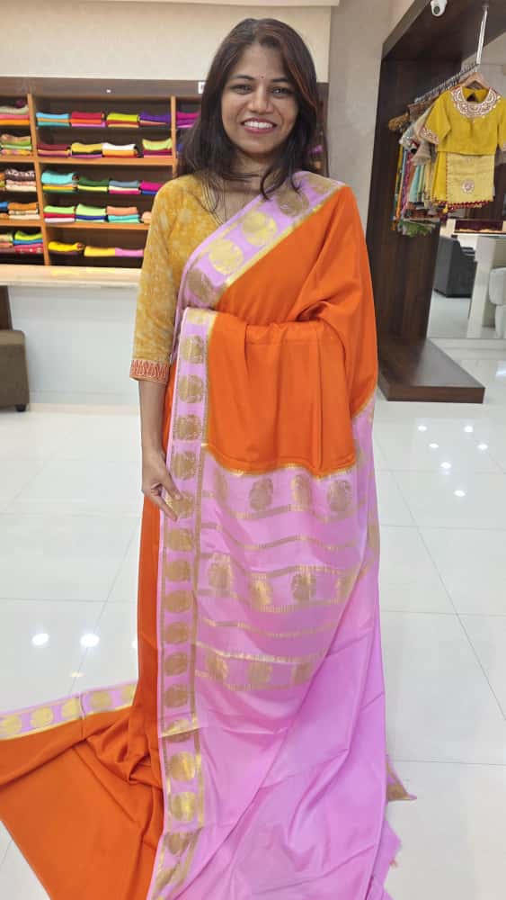 mysore crepe silk sarees in KSIC Finish in orange with baby pink ganda berunda border