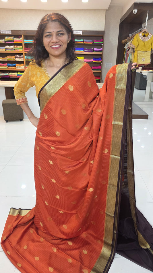Mysore crepe silk saree in KSIC Finish in rust orange dark snuff brown all over butta saree