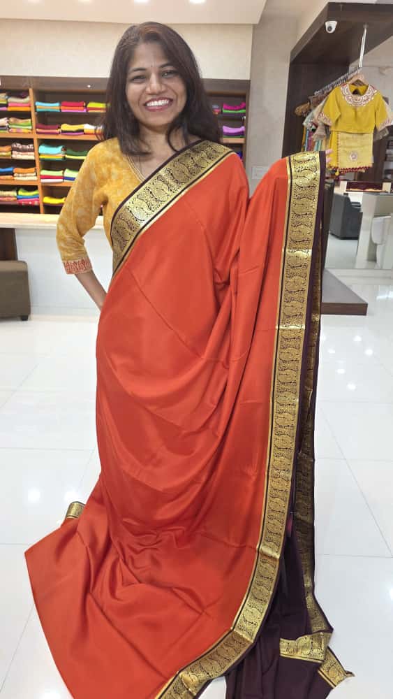 Mysore crepe silk sarees KSIC Finish in rust orange with dark brown peacock border
