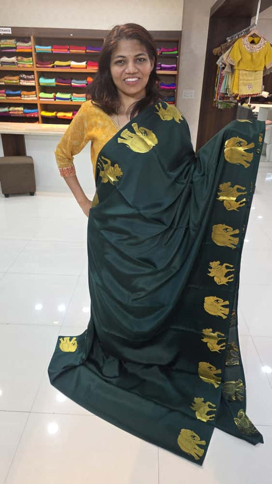 Mysore crepe silk saree with KSIC Finish in bottle green self color elephant border