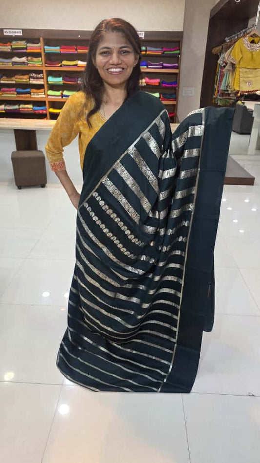 Mysore crepe silk saree with KSIC Finish dark bottle green neetha ambani saree