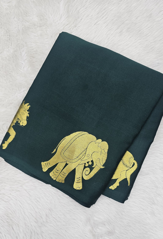 Mysore crepe silk saree with KSIC Finish in bottle green self color elephant border