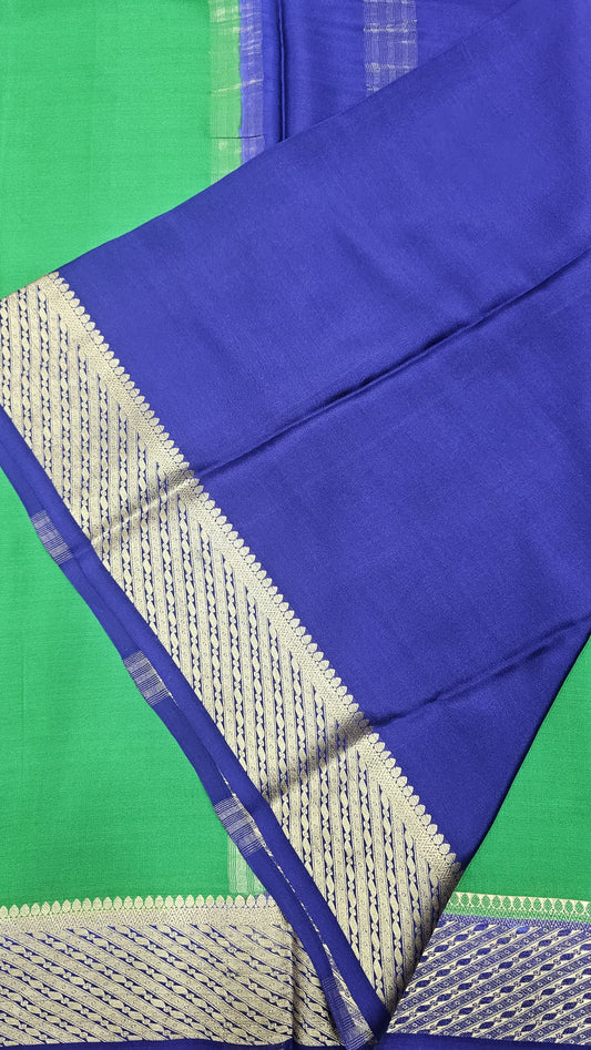 Mysore crepe silk saree with KSIC Finish in leaf green with ink blue with big border